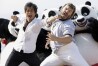 Actors Jack Black, right, and Tatsuya Yamaguchi participate in a stunt on the Carlton beach pier for the film "Kung Fu Panda" during the 61st Cannes International Film Festival in Cannes, southern France, Wednesday, May 14, 2008. (AP Photo/Matt Sayles, File)