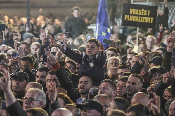 Supporters of Albanian opposition gather to protest in front of Government building in Tirana, Albania, Tuesday, Feb. 20, 2024. Thousands of supporters of Albania's opposition on Tuesday held an anti-government protest accusing the Cabinet of corruption and also to commemorate the fall of the monument of the late communist dictator in 1991. (AP Photo / Armando Babani)