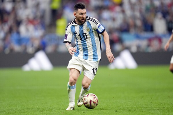 FILE - Argentina's Lionel Messi goes for the ball during the World Cup final soccer match between Argentina and France at the Lusail Stadium in Lusail, Qatar, Sunday, Dec. 18, 2022. Messi is undoubtedly the face of this year's Copa America. (AP Photo/Manu Fernandez, File)