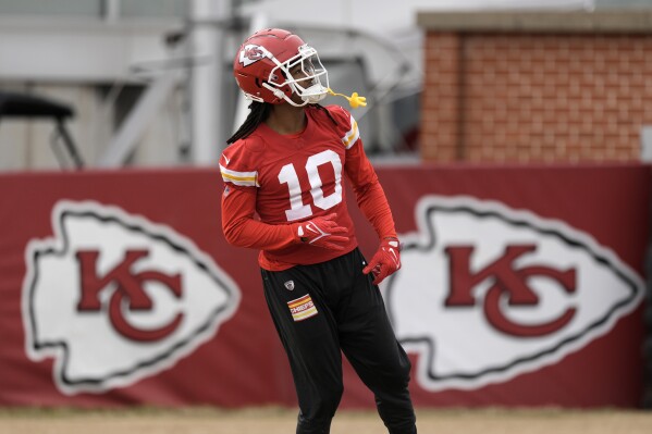 Kansas City Chiefs running back Isiah Pacheco stretches during the team's NFL football practice Thursday, Feb. 1, 2024 in Kansas City, Mo. The Chiefs will play the San Francisco 49ers in Super Bowl 58. (AP Photo/Charlie Riedel)