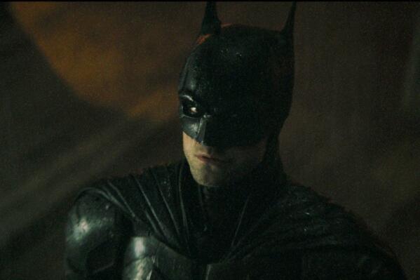 This image released by Warner Bros. Pictures shows Robert Pattinson in "The Batman." Warner Bros. released the first trailer for “The Batman,” which is Pattinson’s first film as the Dark Knight. It will be released March 4, 2022. (Warner Bros. Pictures via AP)
