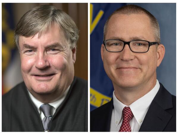 FILE - This combo of images provided the North Carolina Administrative Office of the Courts, left, and the Trey Allen Campaign, shows Associate Justice Sam Ervin IV, left, a Democrat and Trey Allen, currently general counsel for the state court system. The pair are running against each other running for North Carolina Supreme Court. (North Carolina Administrative Office of the Courts, left; Trey Allen Campaign right, via AP, File)
