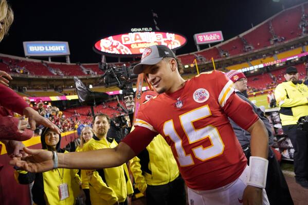 Kansas City Chiefs safety Tyrann Mathieu (32) interacts with a fan