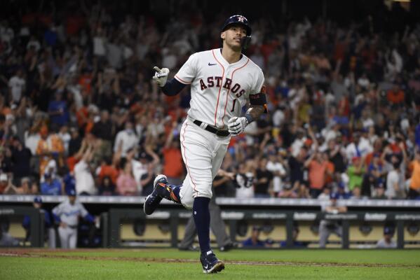 Houston Astros Carlos Correa celebrates with Jose Altuve after hitting a  two-run home run against the Los Angeles Dodgers in the seventh inning in  the 2017 MLB World Series game five at