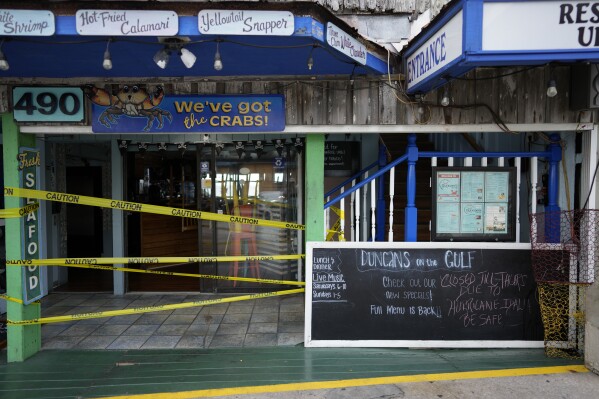 A chalkboard outside Duncan's on the Gulf reads 