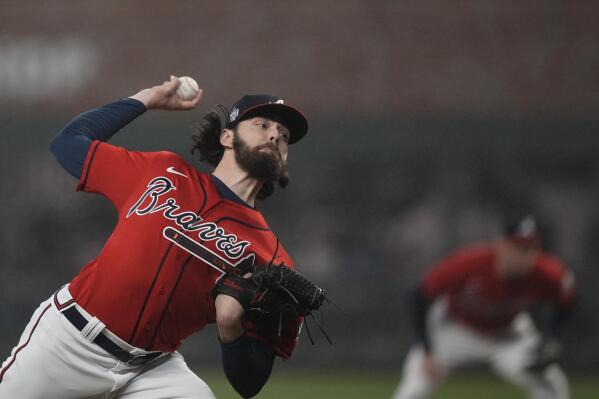 Atlanta Braves starting pitcher Ian Anderson throws during the first inning in Game 3 of baseball's World Series between the Houston Astros and the Atlanta Braves Friday, Oct. 29, 2021, in Atlanta. (AP Photo/David J. Phillip)