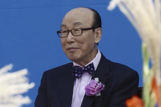 In this Oct. 11, 2013, photo, Rev. Cho Yong-gi attends Grand Prayer Rally for Peace of the Korean Peninsula and for the Hope of the World Church at the World Cup Stadium in Seoul, South Korea. Rev. Cho, whose founding of the biggest South Korean church once stood as a symbol of the post-war growth of Christianity in the country before that achievement was tainted by corruption and scandals, died Tuesday, Sept. 14, 2021. He was 85. (Hong Chan-sun/Newsis via AP)