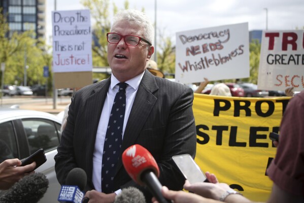 Defendant David McBride talks to the media before his court appearance in Canberra, Australia on Feb. 14, 2020. (AP Photo/Rod McGuirk, File)