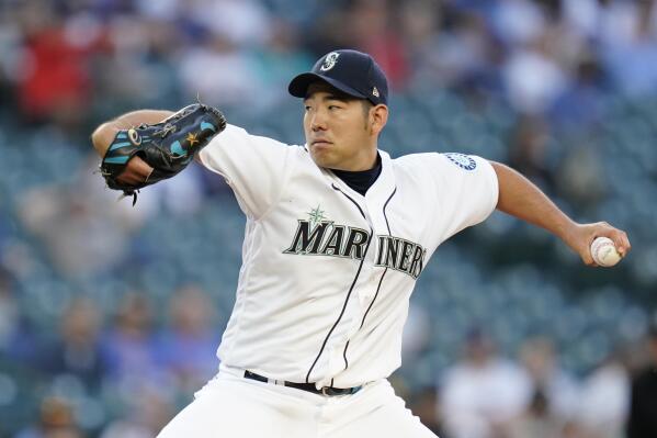 Seattle Mariners starting pitcher Yusei Kikuchi throws to a New York Yankees batter during the second inning of a baseball game Wednesday, July 7, 2021, in Seattle. (AP Photo/Elaine Thompson)