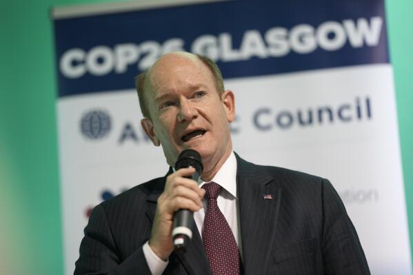 FILE - Sen. Chris Coons, D-Del., speaks at the COP26 U.N. Climate Summit in Glasgow, Scotland, Nov. 6, 2021. The Biden administration is expected to ask Congress for a spending package that could significantly exceed $10 billion for the U.S. response to Russia's invasion of Ukraine, Coons a leading Democratic senator said Friday, Feb. 25, 2022. (AP Photo/Alastair Grant, File)