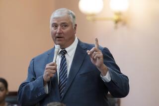 FILE - Rep. Larry Householder defends himself against a resolution for his expulsion during a session of the Ohio House at the Ohio Statehouse in Columbus, Ohio, Wednesday, June 16, 2021. Federal prosecutors say former Ohio House Speaker Larry Householder's arguments that a racketeering conspiracy charge against him should be dismissed are legally invalid. Prosecutors filed a motion Tuesday, Feb. 22, 2022.(Adam Cairns/The Columbus Dispatch via AP, File)
