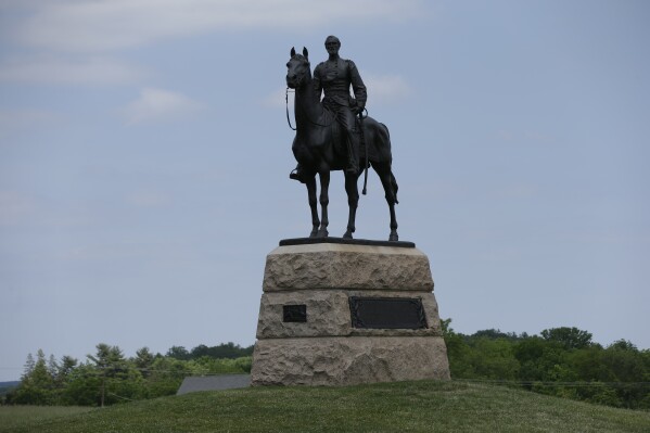 A monument to Major General George Gordon Meade sits atop a ridge held by Union troops, above the field of Pickett's Charge, Wednesday, June 5, 2013, in Gettysburg, Pa. (ĢӰԺ Photo/Matt Rourke)