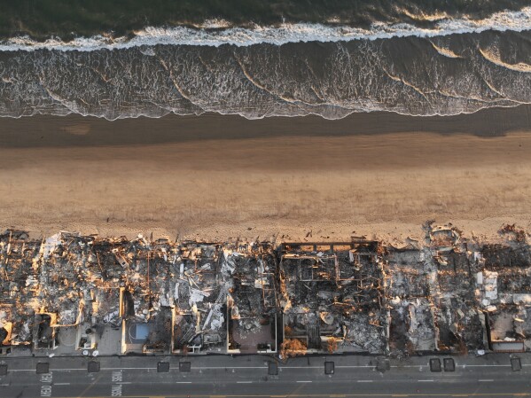 An aerial view shows the devastation by the Palisades Fire Thursday, Jan. 16, 2025 in Malibu, Calif. (AP Photo/Jae C. Hong, File)