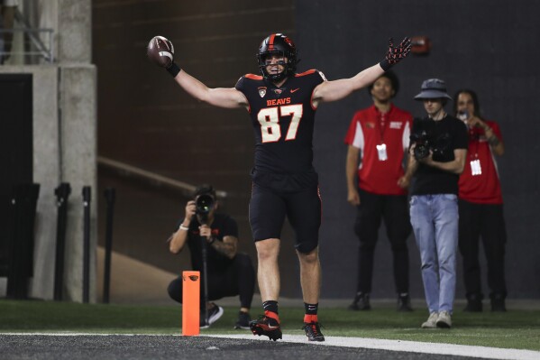 Oregon State tight end Riley Sharp celebrates after scoring a touchdown against UC Davis during the second half of an NCAA college football game Saturday, Sept. 9, 2023, in Corvallis, Ore. (AP Photo/Amanda Loman)