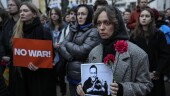 A woman holds a portrait of opposition leader Alexei Navalny during a protest in front of the Russian embassy in Berlin, Germany, Friday, Feb. 16, 2024. Navalny, who crusaded against official corruption and staged massive anti-Kremlin protests as President Vladimir Putin's fiercest foe, died Friday in the Arctic penal colony where he was serving a 19-year sentence, Russia's prison agency said. He was 47. (AP Photo/Ebrahim Noroozi)