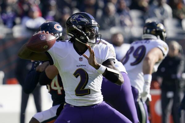 Baltimore Ravens quarterback Tyler Huntley passes during the first half of an NFL football game against the Chicago Bears Sunday, Nov. 21, 2021, in Chicago. (AP Photo/Nam Y. Huh)