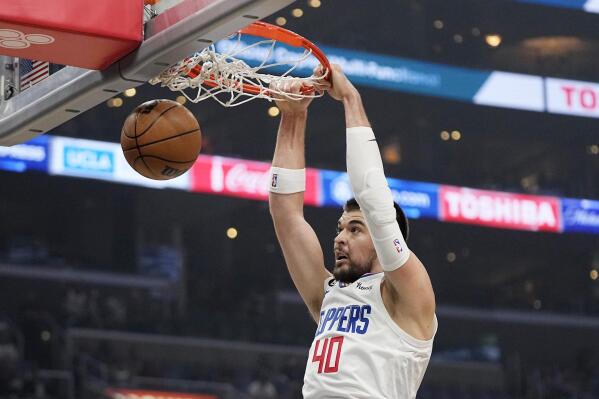 Los Angeles Clippers center Ivica Zubac dunks during the first half of an NBA basketball game against the Indiana Pacers Sunday, Nov. 27, 2022, in Los Angeles. (AP Photo/Mark J. Terrill)