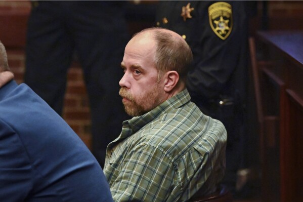 FILE 鈥� Craig N. Ross, Jr. is arraigned before Judge James A. Murphy III on charges related to the kidnapping of a 9-year-old from Moreau Lake State Park Friday, Nov. 17, 2023, at Saratoga County Court in Ballston Spa, NY. Ross pleaded guilty, Wednesday, Feb. 21, 2024, to two felony counts and faces 47 years to life in prison. (Will Waldron/The Albany Times Union via 番茄直播, File)