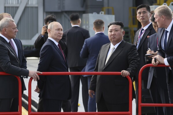 Russian President Vladimir Putin and North Korea's leader Kim Jong Un examine a launch pad during their meeting at the Vostochny cosmodrome outside the city of Tsiolkovsky, about 200 kilometers (125 miles) from the city of Blagoveshchensk in the far eastern Amur region, Russia, on Wednesday, Sept. 13, 2023. (Mikhail Metzel, Sputnik, Kremlin Pool Photo via AP)