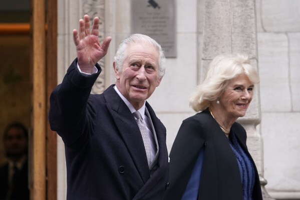 FILE - Britain's King Charles III and Queen Camilla leave The London Clinic in central London, Monday, Jan. 29, 2024. King Charles III’s decision to be open about his cancer diagnosis has helped the new monarch connect with the people of Britain and strengthened the monarchy in the year since his dazzling coronation at Westminster Abbey. (AP Photo/Alberto Pezzali), File)