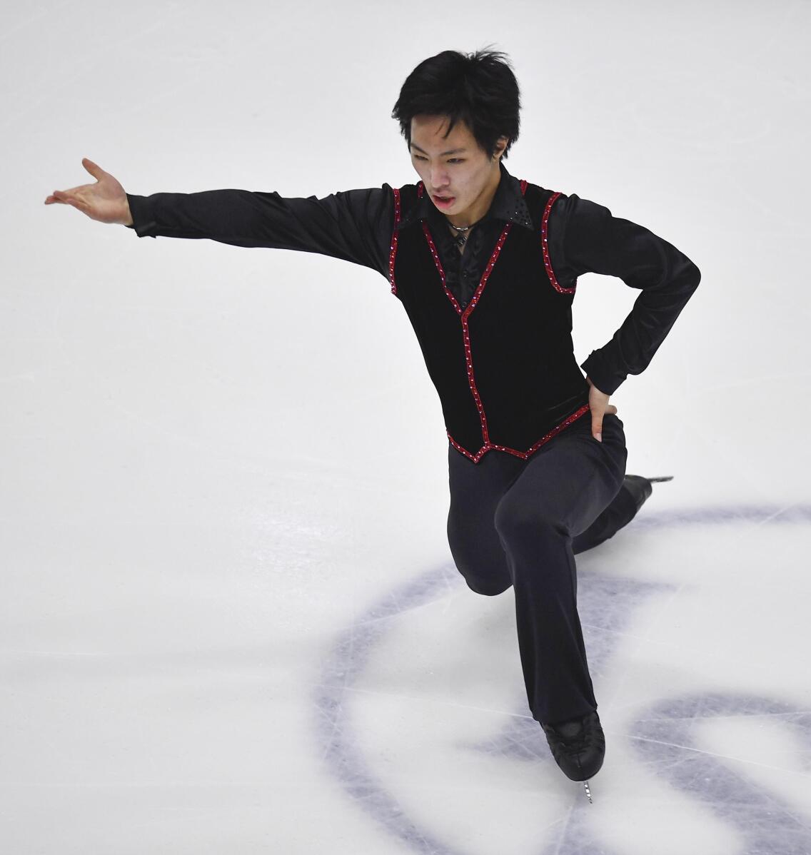 Cha fall to win Four Continents figure skating AP News