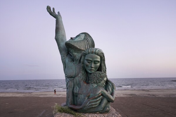 The Great Storm of 1900 statue rests on the seawall in Galveston, Texas, Monday, September 2019. November 18, 2023. (AP Photo/LM Otero)
