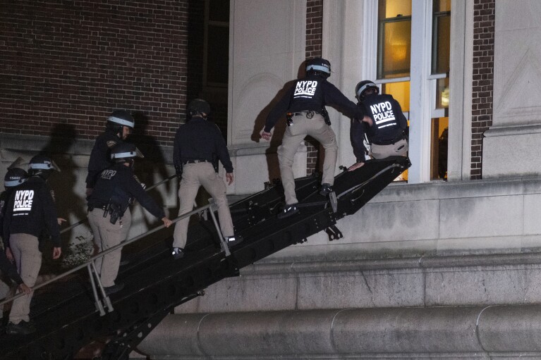 On Tuesday, April 30, 2024, New York City police used tactical vehicles to enter the upper floors of Hamilton Hall on the Columbia University campus after the building was occupied by protesters early Tuesday.  (AP Photo/Craig Rattle)