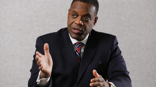 FILE - Detroit emergency manager Kevyn Orr speaks during an interview with The Associated Press in Detroit, Thursday, Dec. 12, 2013. The architect of Detroit's bankruptcy filing admits it was a miserable process. But 10 years on, Detroit's former emergency manager, Orr, maintains the restructuring of the Motor City is among his most important accomplishments. On July 18, 2013, Detroit became the largest city in the U.S. to file for bankruptcy. (AP Photo/Paul Sancya, File)