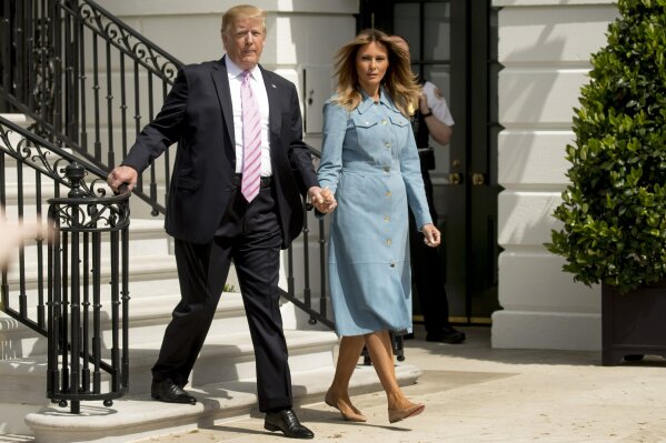 
              President Donald Trump and first lady Melania Trump arrive for the annual White House Easter Egg Roll on the South Lawn of the White House, Monday, April 22, 2019, in Washington. (AP Photo/Andrew Harnik)
            