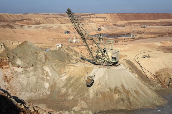 An aerial view of an ilmenite open pit mine in a canyon in the central region of Kirovohrad, Ukraine, Wednesday, Feb. 12, 2025. (AP Photo/Efrem Lukatsky)