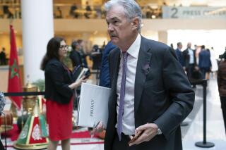 Federal Reserve Chairman Jerome Powell arrives for the plenary of the International Monetary and Financial Committee (IMFC) meeting, during the World Bank/IMF Spring Meetings at the International Monetary Fund (IMF) headquarters in Washington, Friday, April 14, 2023. (AP Photo/Jose Luis Magana)
