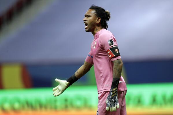 FILE - Peru's goalkeeper Pedro Gallese reacts after missing a chance to score during a Copa America third place soccer match against Colombia at the National stadium in Brasilia, Brazil, Friday, July 9, 2021. Peru goalkeeper Pedro Gallese was released without charges after an altercation with Spanish police officers in front of the hotel where the national team is staying in Madrid, Peru's foreign ministry said Tuesday, March 28, 2023. (AP Photo/Andre Penner, File)