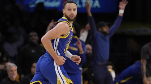 Golden State Warriors guard Stephen Curry runs back after scoring during the first half in Game 6 of an NBA basketball Western Conference semifinal series against the Los Angeles Lakers Friday, May 12, 2023, in Los Angeles. (AP Photo/Ashley Landis)