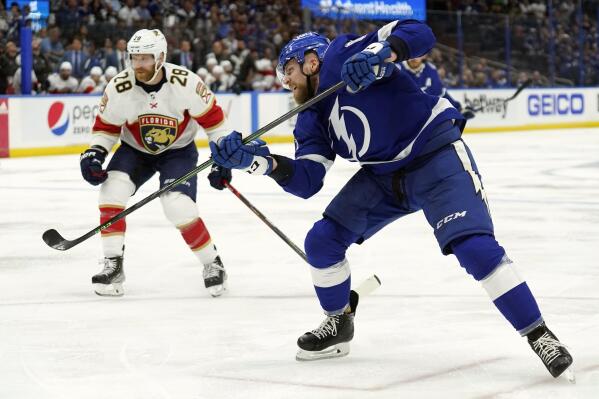 Tampa Bay Lightning defenseman Erik Cernak (81) watches his shot get past Florida Panthers goaltender Sergei Bobrovsky for a goal during the second period in Game 3 of an NHL hockey second-round playoff series Sunday, May 22, 2022, in Tampa, Fla. Looking on is Panthers' Claude Giroux (28). (AP Photo/Chris O'Meara)