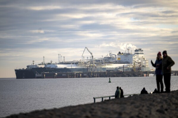 FILE - The tanker Maria Energy, left, loaded with liquefied natural gas, is moored at the floating terminal Hoegh Esperanza, in Wilhelmshaven, Germany, Jan. 3, 2023. Attacks by Yemen's Houthi rebels are posing a new threat to the future of energy supplies to the European Union, which relies on imported oil and natural gas to power factories, generate electricity, run vehicles and more. (Sina Schuldt/dpa via AP, file)