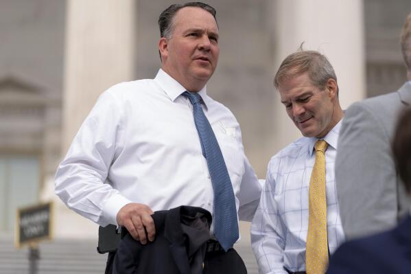 FILE - Rep. Alexander Mooney, R-W.Va., left, and Rep. Jim Jordan, R-Ohio, right, appear at a news conference on the steps of the Capitol in Washington, Thursday, July 29, 2021. (AP Photo/Andrew Harnik, File)