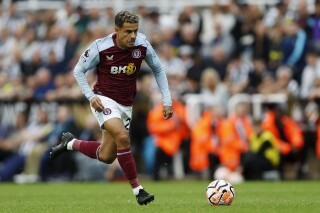 FILE - Aston Villa's Philippe Coutinho controls the ball during the English Premier League soccer match between Newcastle and Aston Villa at St. James' Park in Newcastle, England, Saturday, Aug. 12, 2023. After spells with some of European soccer's biggest clubs, Coutinho joined Qatari team Al Duhail on a season-long loan from Aston Villa on Friday, Sept. 8. (AP Photo/Steve Luciano, File)