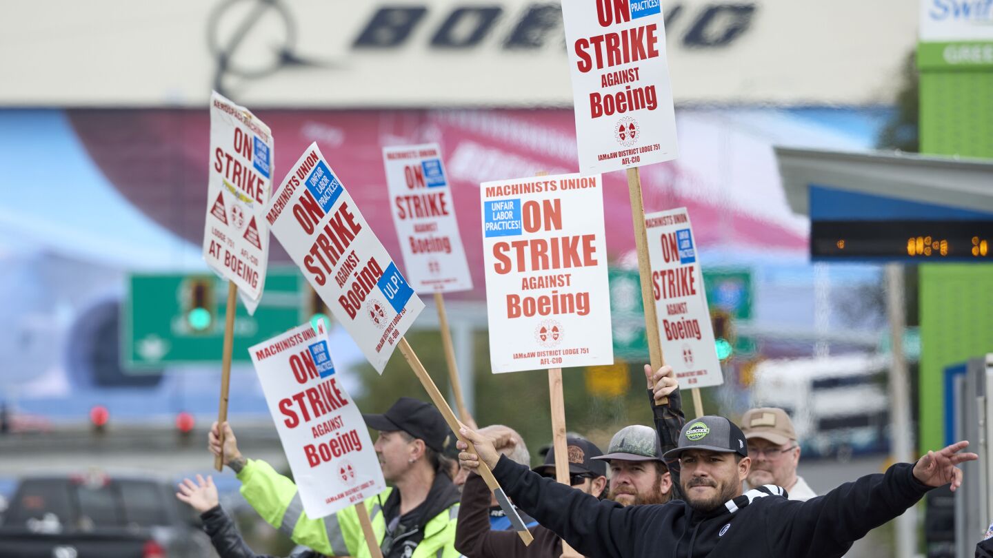 Boeing strike: 33,000 factory workers walk off the job over pay