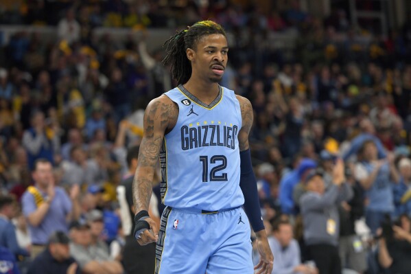 FILE - Memphis Grizzlies guard Ja Morant (12) plays during the second half of Game 5 in a first-round NBA basketball playoff series against the Los Angeles Lakers, April 26, 2023, in Memphis, Tenn. Prosecutors will not pursue an assault charge against Davonte Pack, a close friend of Morant, stemming from a fight during a pickup basketball game at the player’s home last year, court records showed Tuesday, Nov. 21. (AP Photo/Brandon Dill, File)