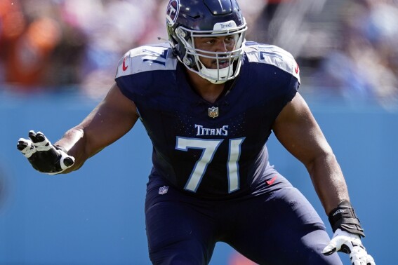 FILE - Tennessee Titans offensive tackle Andre Dillard plays during the first half of an NFL football game against the Cincinnati Bengals, Oct. 1, 2023, in Nashville, Tenn. Dillard has signed with the Green Bay Packers one month after the Titans released him. Dillard, 28, made 10 starts and played 16 games at left tackle for the Titans last season but was benched at one point in the season as the team started four different players at that spot. (AP Photo/George Walker IV, File)