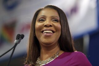 
              FILE - In this Jan. 6, 2019 file photo, Attorney General of New York, Letitia James, smiles during an inauguration ceremony in New York. James has opened a civil investigation into President Donald Trump's business dealings, taking action after his former lawyer told Congress he exaggerated his wealth to obtain loans. A person familiar with the inquiry said James issued subpoenas Monday, March 11, to Deutsche Bank and Investors Bank seeking records related to four Trump real estate projects and his failed 2014 bid to buy the NFL's Buffalo Bills.  (AP Photo/Seth Wenig, File)
            