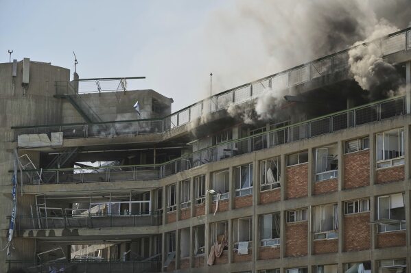 Smokes raises from a building of the Soroka hospital complex after it was hit by a missile fired from Iran in Beersheba, Israel, Thursday, June 19, 2025. (AP Photo/Leo Correa)