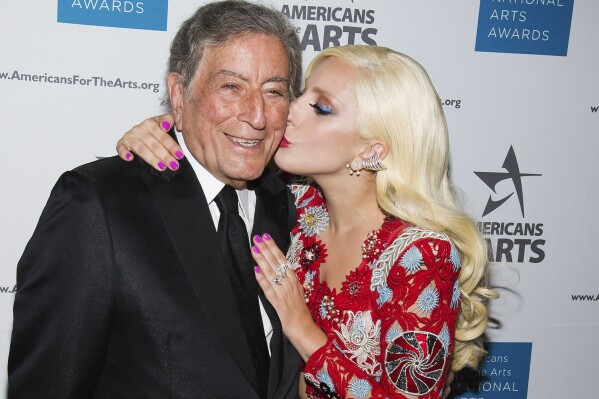 FILE - Tony Bennett, left, and Lady Gaga appear at the Americans for the Arts 2015 National Arts Awards in New York on Oct. 19, 2015. Bennett died Friday, July 21, 2023. at age 96. (Photo by Charles Sykes/Invision/AP, File)