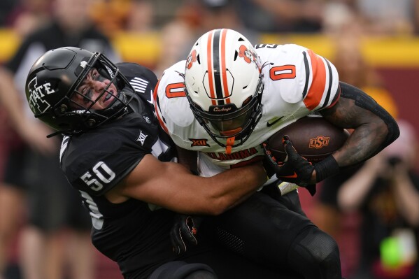 Gordon romps for 282 yards, 4 TDs, Oklahoma State outlasts West