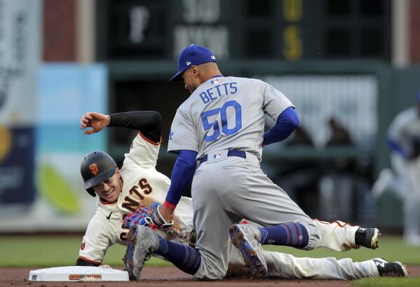 Giants' Wilmer Flores decided to test the Dodgers' Mookie Betts. It didn't  work.