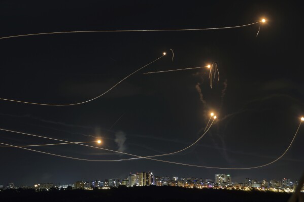 Israeli Iron Dome air defense system fires to intercept a rocket fired from the Gaza Strip, in Ashkelon, Israel, on Oct. 20, 2023. (AP Photo/Avi Roccah, File)