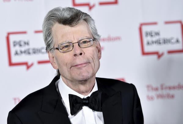 FILE - Stephen King poses for a photo May 22, 2018, at the 2018 PEN Literary Gala in New York. The government and publishing titan Penguin Random House are set to exchange opening salvos in a federal antitrust trial Monday, Aug. 1, 2022, as the U.S. seeks to block the biggest U.S. book publisher from absorbing rival Simon & Schuster. The government’s “star” witness will be Stephen King, the renowned and genre-transcending author whose works are published by Simon & Schuster. (Photo by Evan Agostini/Invision/AP, File)