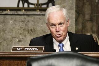FILE - In this April 27, 2021 file photo, Sen. Ron Johnson, R-Wisc., speaks on Capitol Hill in Washington. Johnson said Thursday, June 3, 2021, he remains undecided about seeking a third term in 2022 and feels no pressure to make up his mind any time soon. (T.J. Kirkpatrick/The New York Times via AP, Pool File)
