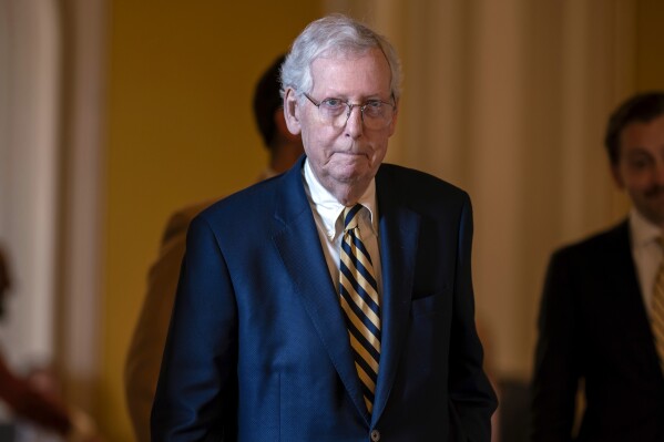 Senate Minority Leader Mitch McConnell, R-Ky., walks to the chamber after a bipartisan group of senators released a highly anticipated bill that pairs border enforcement policy with wartime aid for Ukraine and Israel, at the Capitol in Washington, Monday, Feb. 5, 2024. Senate Republicans have been divided on the bill, but McConnell is committed to the measure. (AP Photo/J. Scott Applewhite)