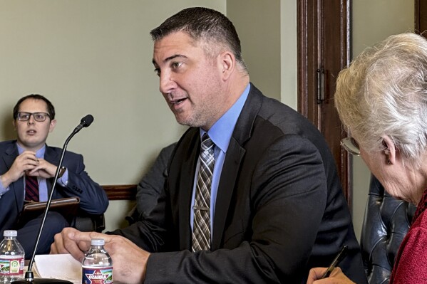Arkansas State Sen. Clint Penzo speaks at a legislative hearing at the state Capitol in Little Rock, Arkansas on Friday, Dec. 15, 2023. Penzo is challenging U.S. Rep. Steve Womack in the Republican primary for the third congressional district in Arkansas. (AP Photo/Andrew DeMillo)